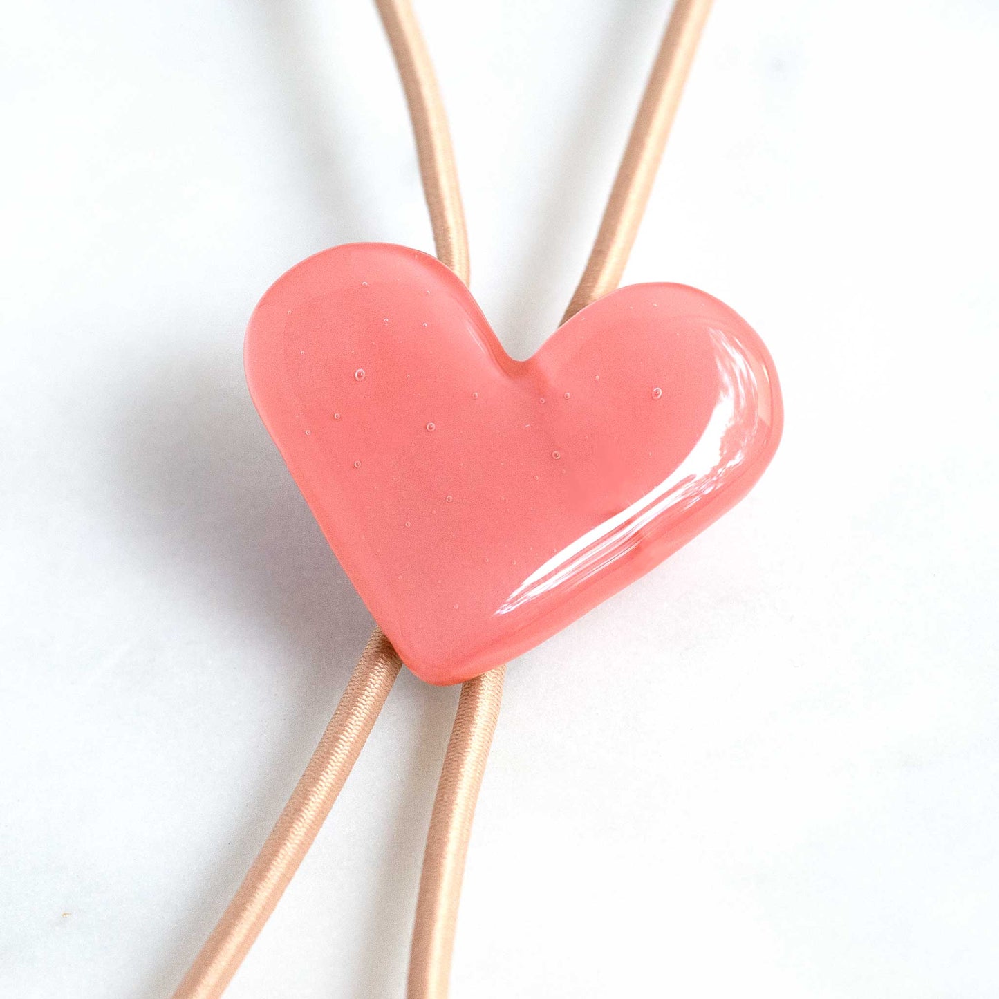 65b2bb63f348b87cbe1f70aa_1004-pc-heart-bolo-sunset-2627-2_1784383847558.jpg