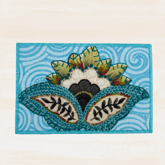65b2bb63f348b87cbe1f70aa_fabric-postcard-1_1785025939128.png