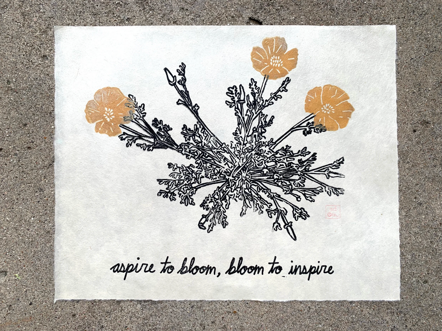 65b2bb63f348b87cbe1f70aa_good-am-aa-aspire-to-bloom-gold_1783447127039.png