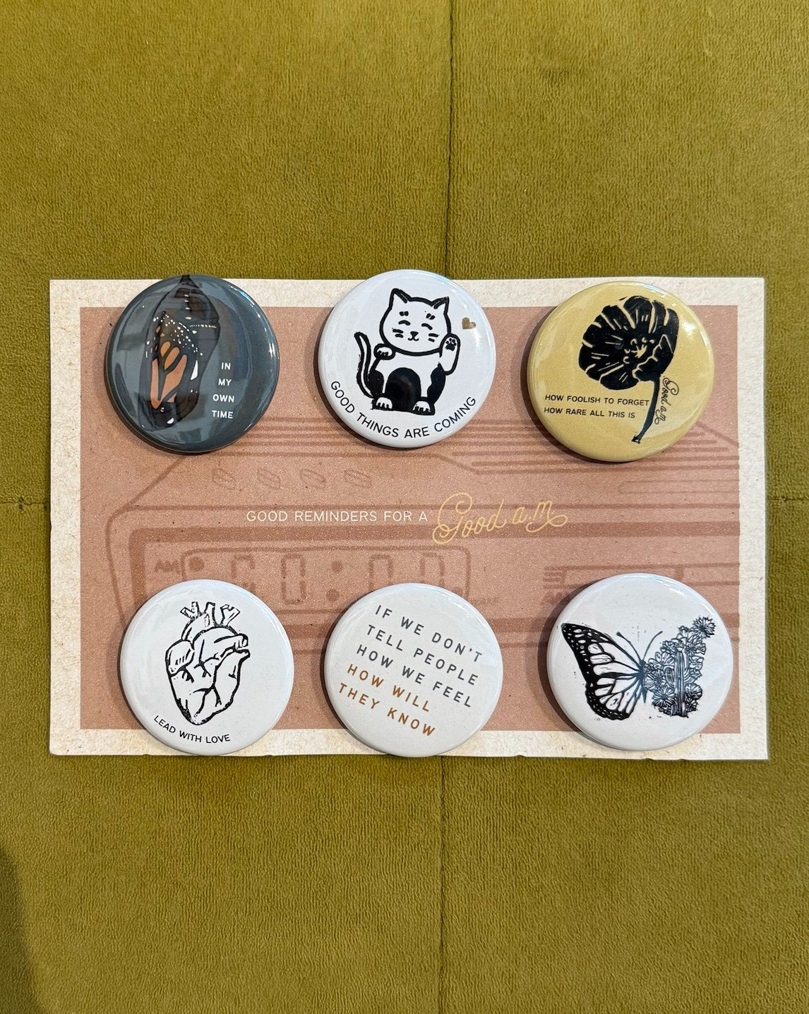 65b2bb63f348b87cbe1f70aa_good-am-set-of-6-buttons_1761157586299.jpg