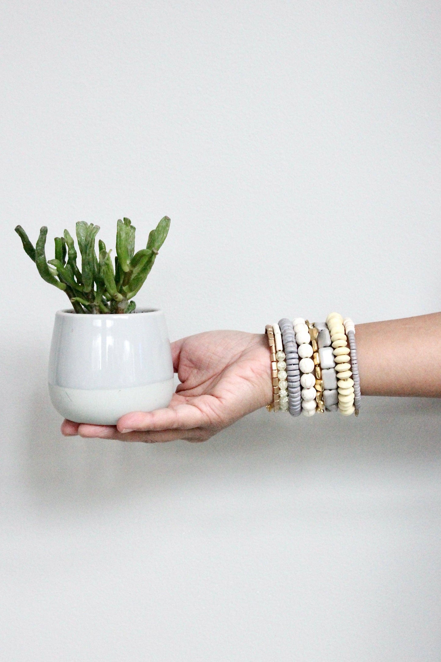 Bracelet- gray, white, and brass wrap