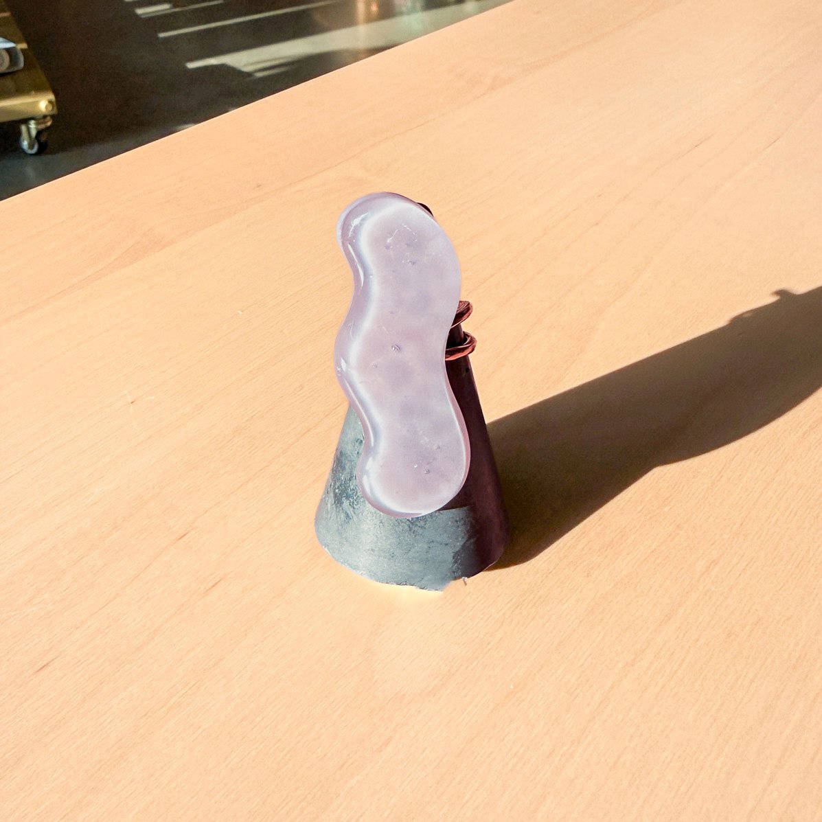 65b2bb63f348b87cbe1f70aa_clover-maven-33-glass-ring-squiggle-lavender_1784405543235.jpg