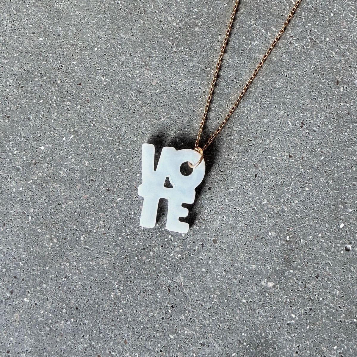65b2bb63f348b87cbe1f70aa_clover-maven-53-vote-glass-charm-pendant-gold-necklace_1784396330810.jpg