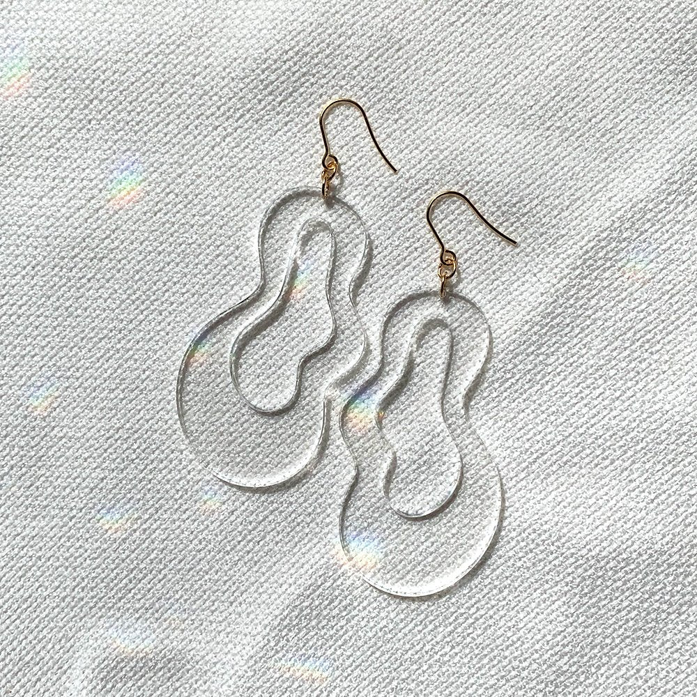 65b2bb63f348b87cbe1f70aa_earring-blob-clear1_1766775037159.jpg