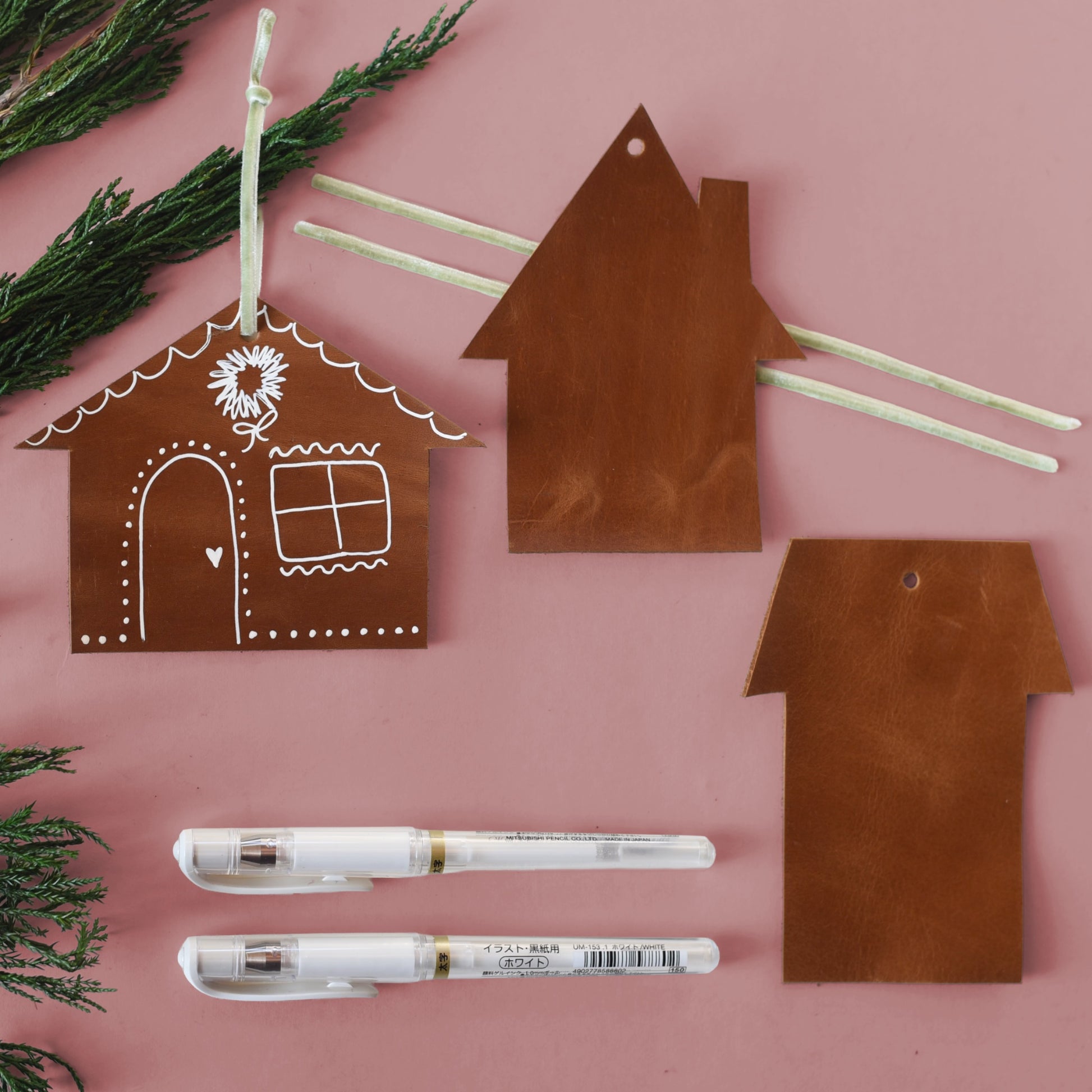 65b2bb63f348b87cbe1f70aa_gingerbread-house-kits-sq-darker-background_1763392971289.png