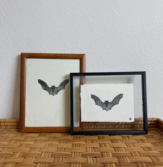 65b2bb63f348b87cbe1f70aa_good-am-bat-print-framed_1783461438976.png