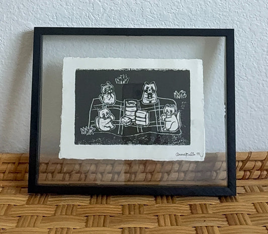 65b2bb63f348b87cbe1f70aa_good-am-cat-picnic-in-black-frame_1783609117649.jpg