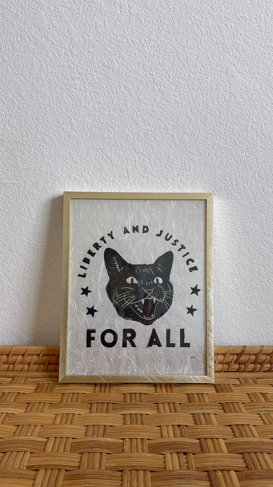 65b2bb63f348b87cbe1f70aa_good-am-liberty-justice-angry-cat_1783462003292.jpg