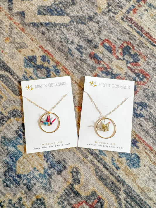 65b2bb63f348b87cbe1f70aa_hoop-crane-necklace_1767723494392.jpg