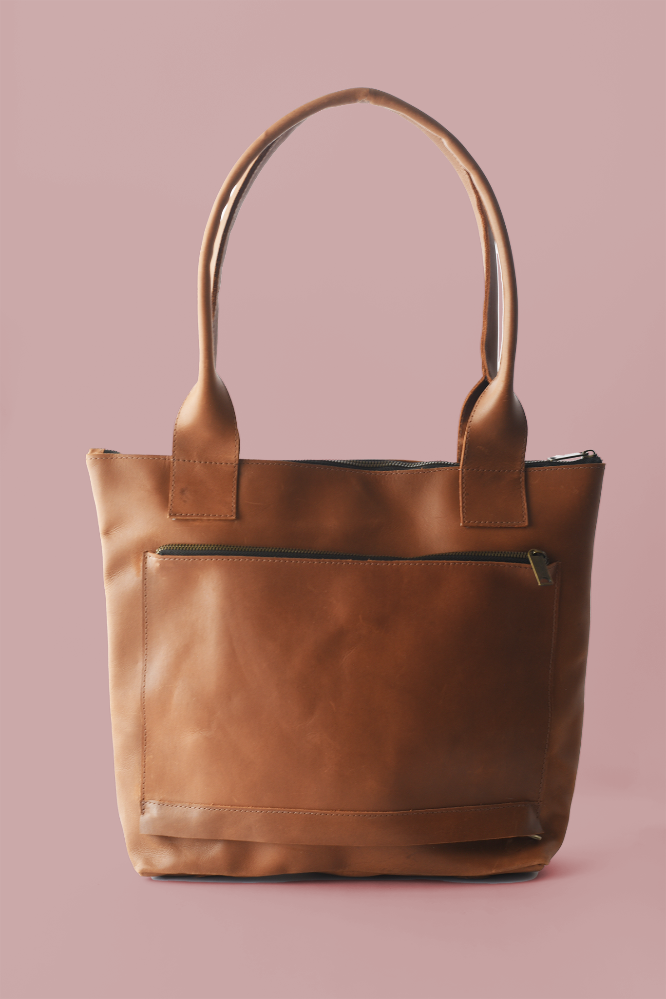 65b2bb63f348b87cbe1f70aa_large-classic-tote-smooth-cognac-back-p-c_1775137202543.png