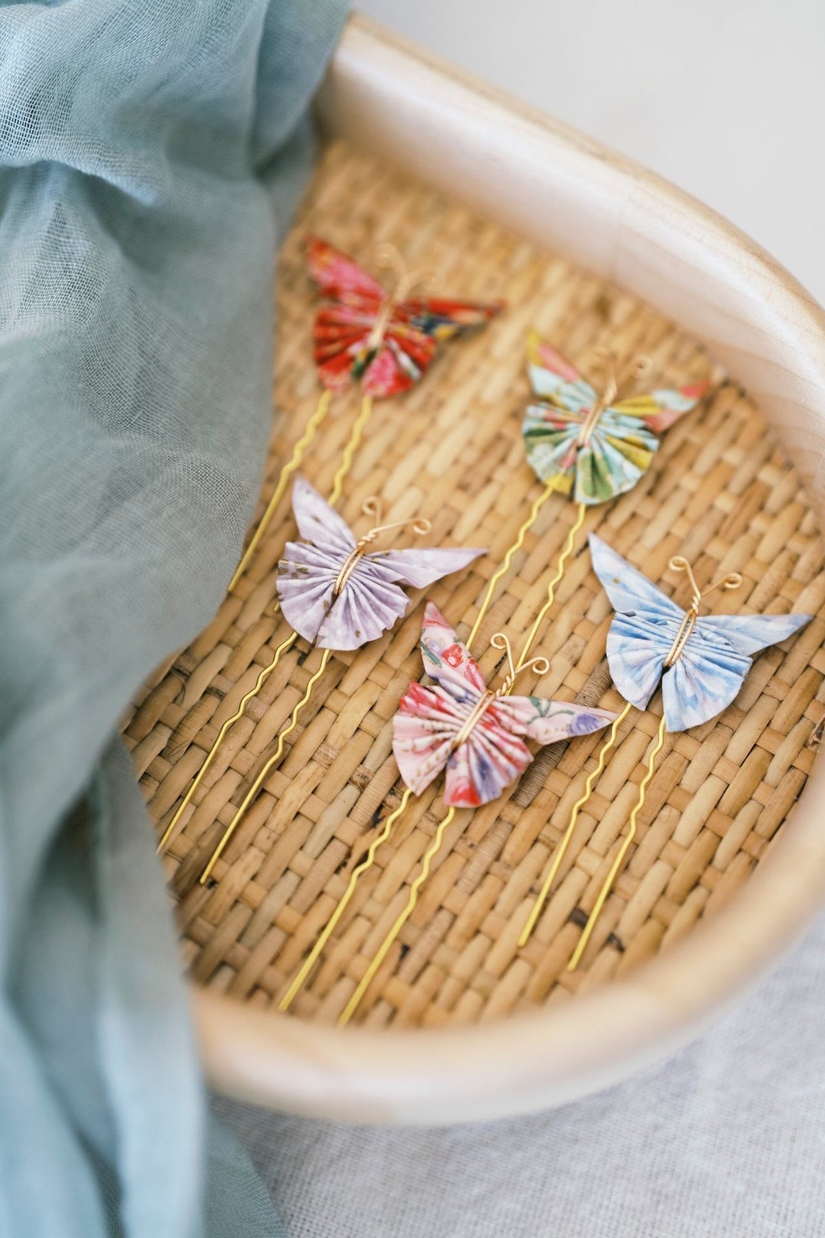65b2bb63f348b87cbe1f70aa_mimi-s-origamis-butterfly-hair-pins_1790793089803.jpg