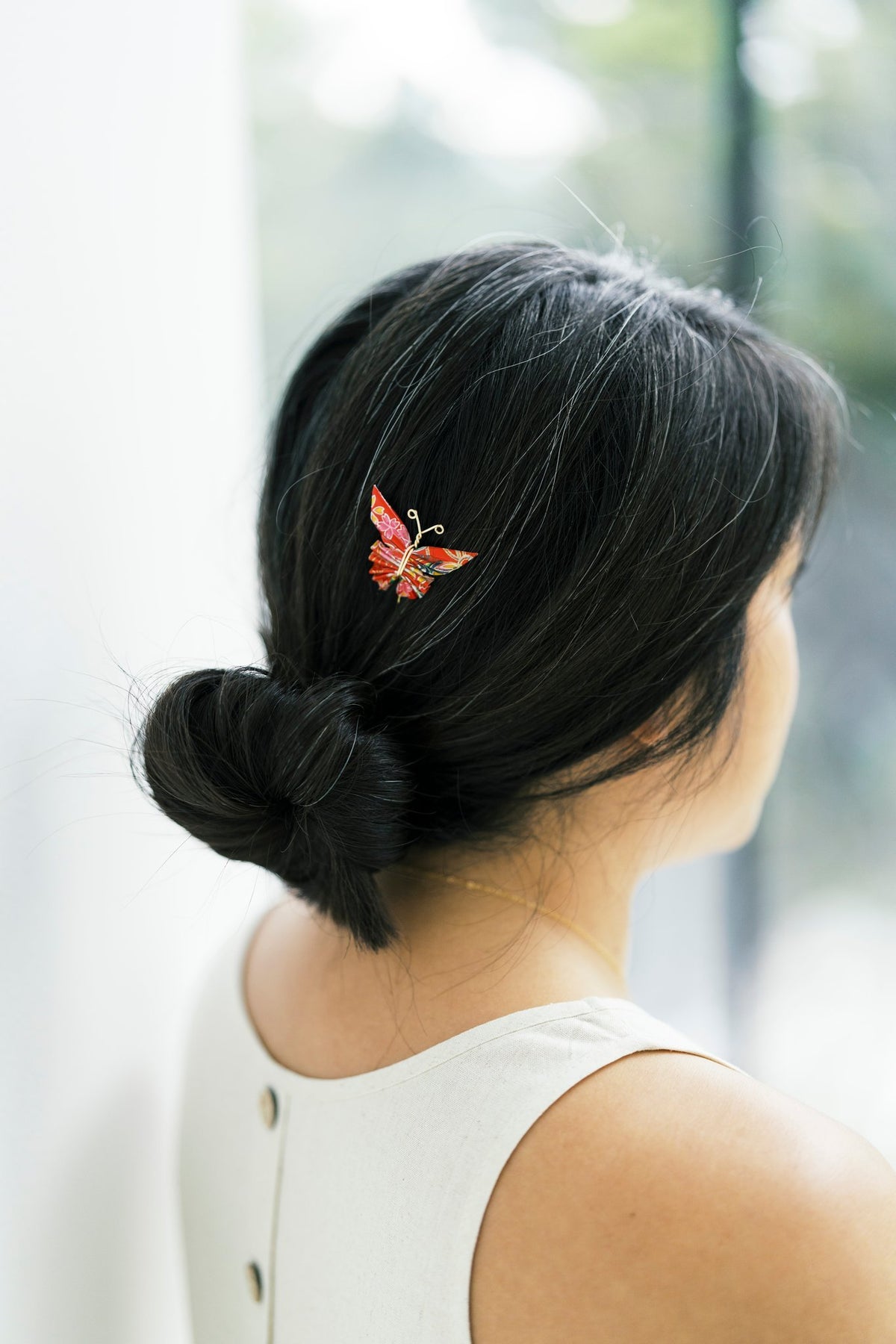 65b2bb63f348b87cbe1f70aa_model-butterfly-hair-pins_1790793168941.jpg