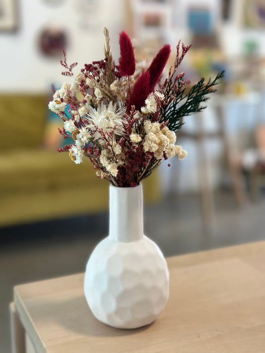 White vase and flowers