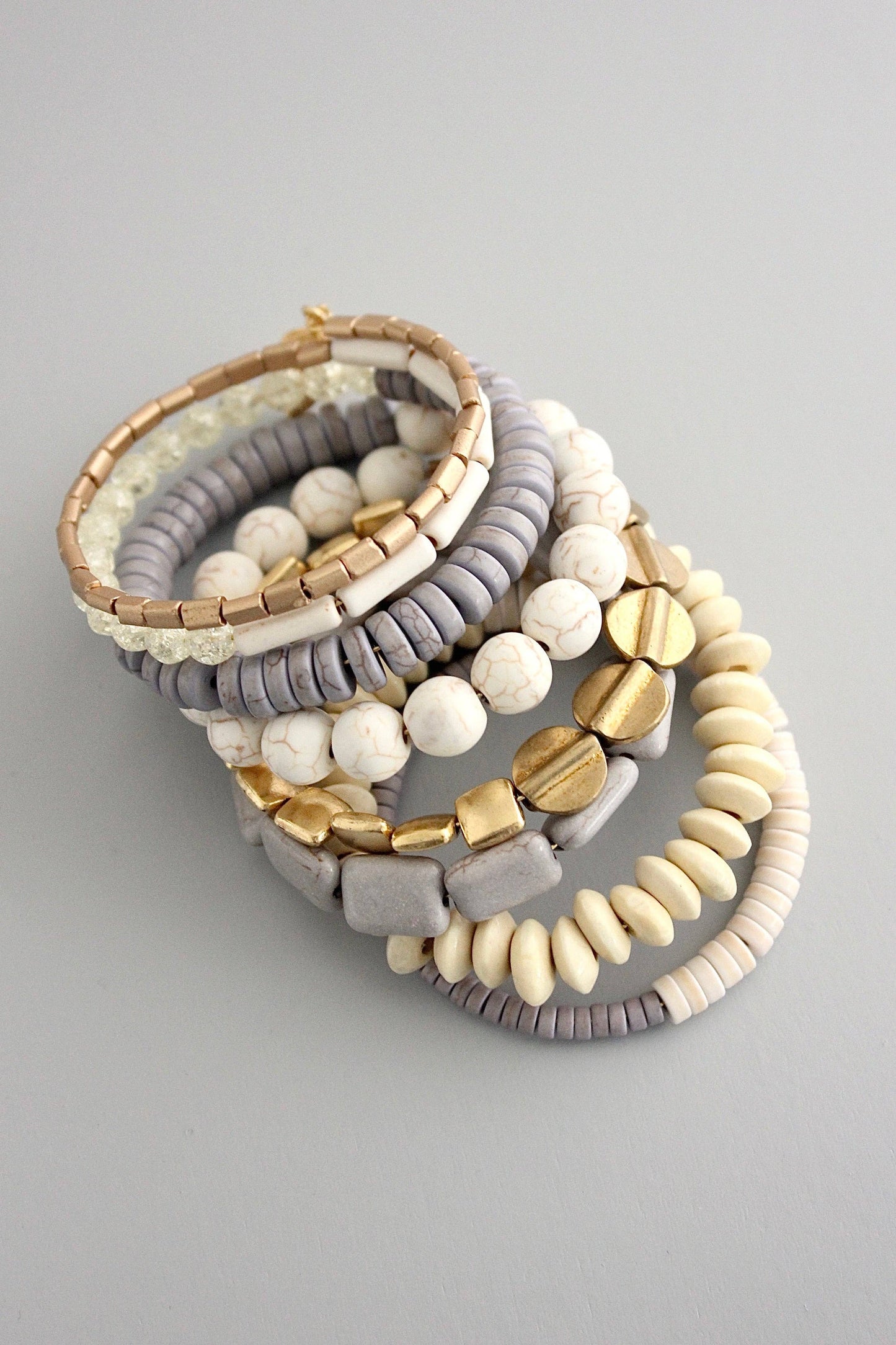 Bracelet- gray, white, and brass wrap